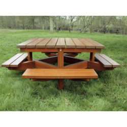 Table avec 4 bancs attenants en bois résineux naturel de traitement