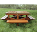 Table avec 4 bancs attenants en bois résineux naturel de traitement